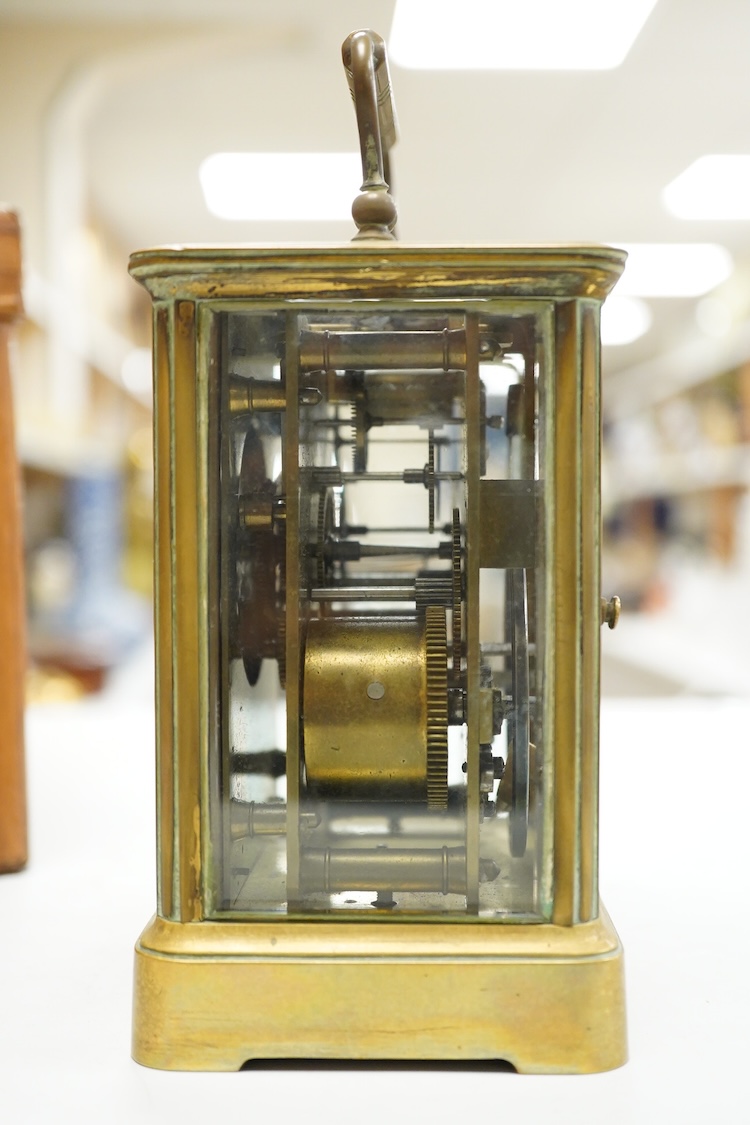 A cased brass carriage timepiece, 17.5cm high